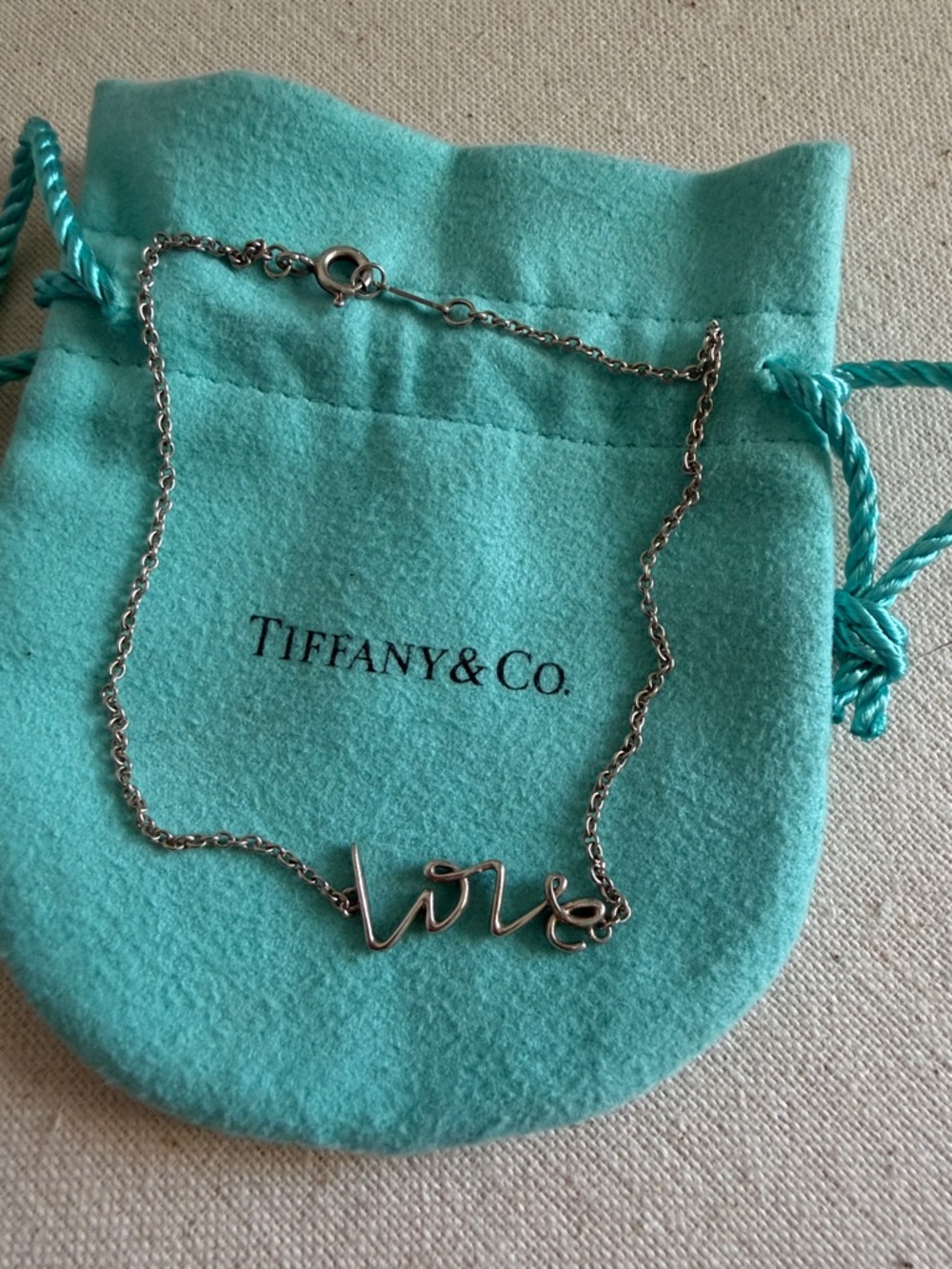 Tiffany & Co. Sterling Silver 'Love' Script bracelet or ankle with Tiffany Pouch
